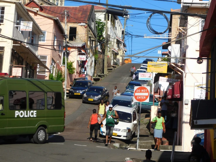 there are a lot of cars that are parked at the corner