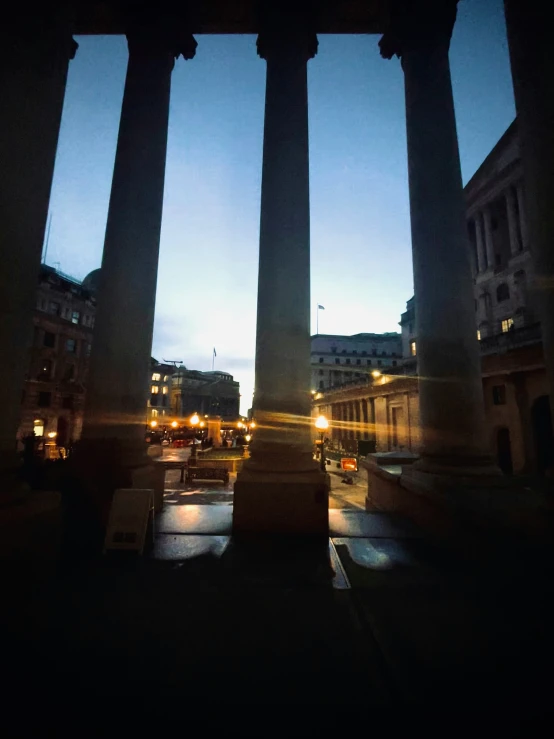 the view of the columns from inside an empty building