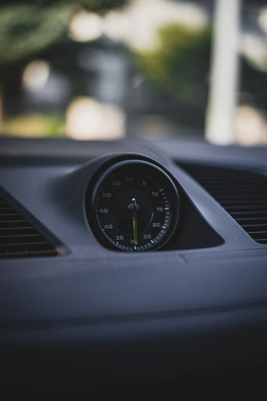 the meter on a car has green arrow pointing