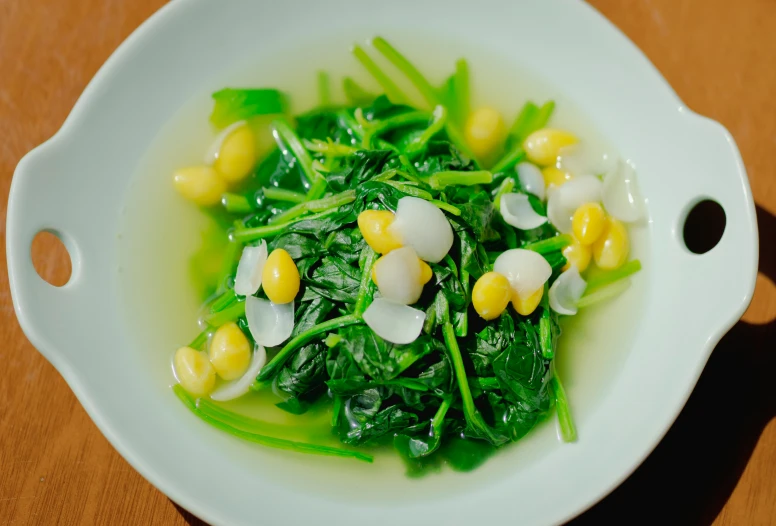 a salad with some vegetables in it on a plate