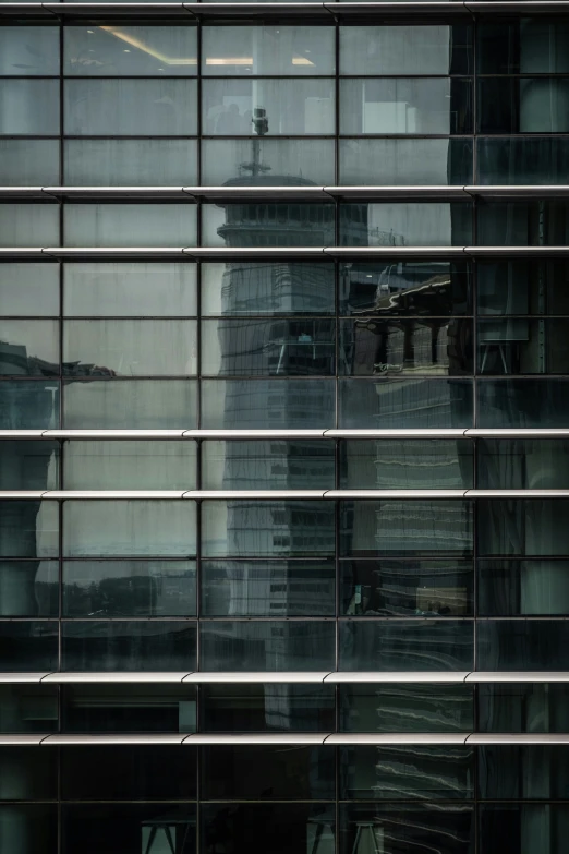 the view of an office building across some windows