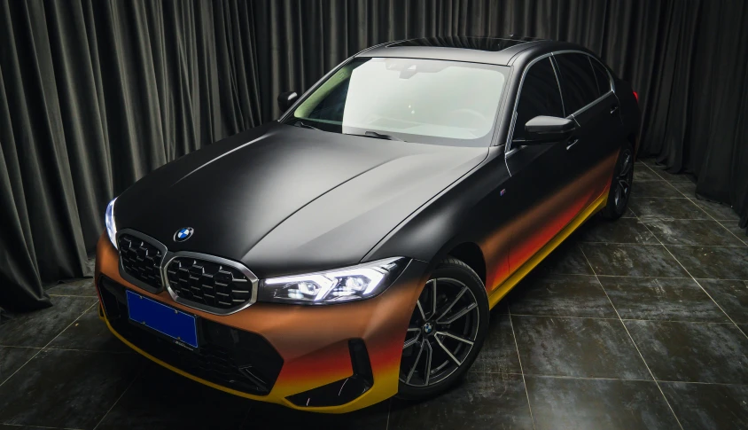 a bmw vehicle with an artistic design painted on it