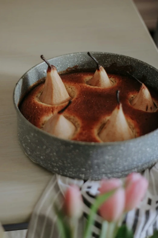 there are fruit pieces being served in the bowl