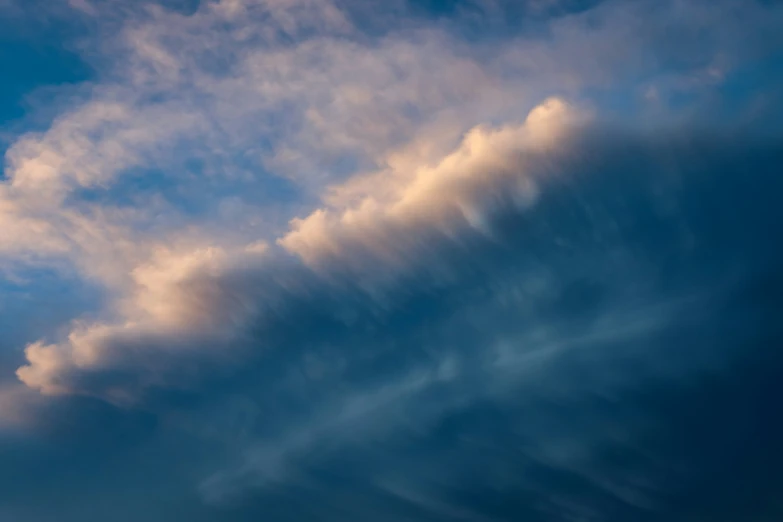 the clouds are mostly white and light blue