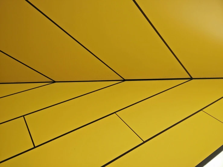 the top part of a yellow colored structure