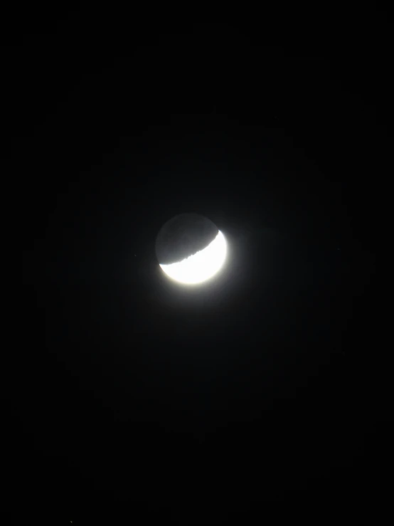 the moon is almost obscured by the far side of the eclipse