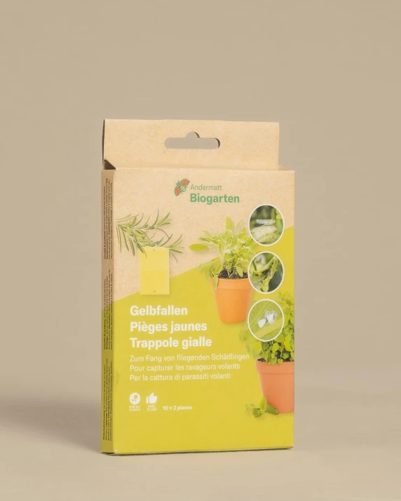 a packaging for some plants with green items inside of it