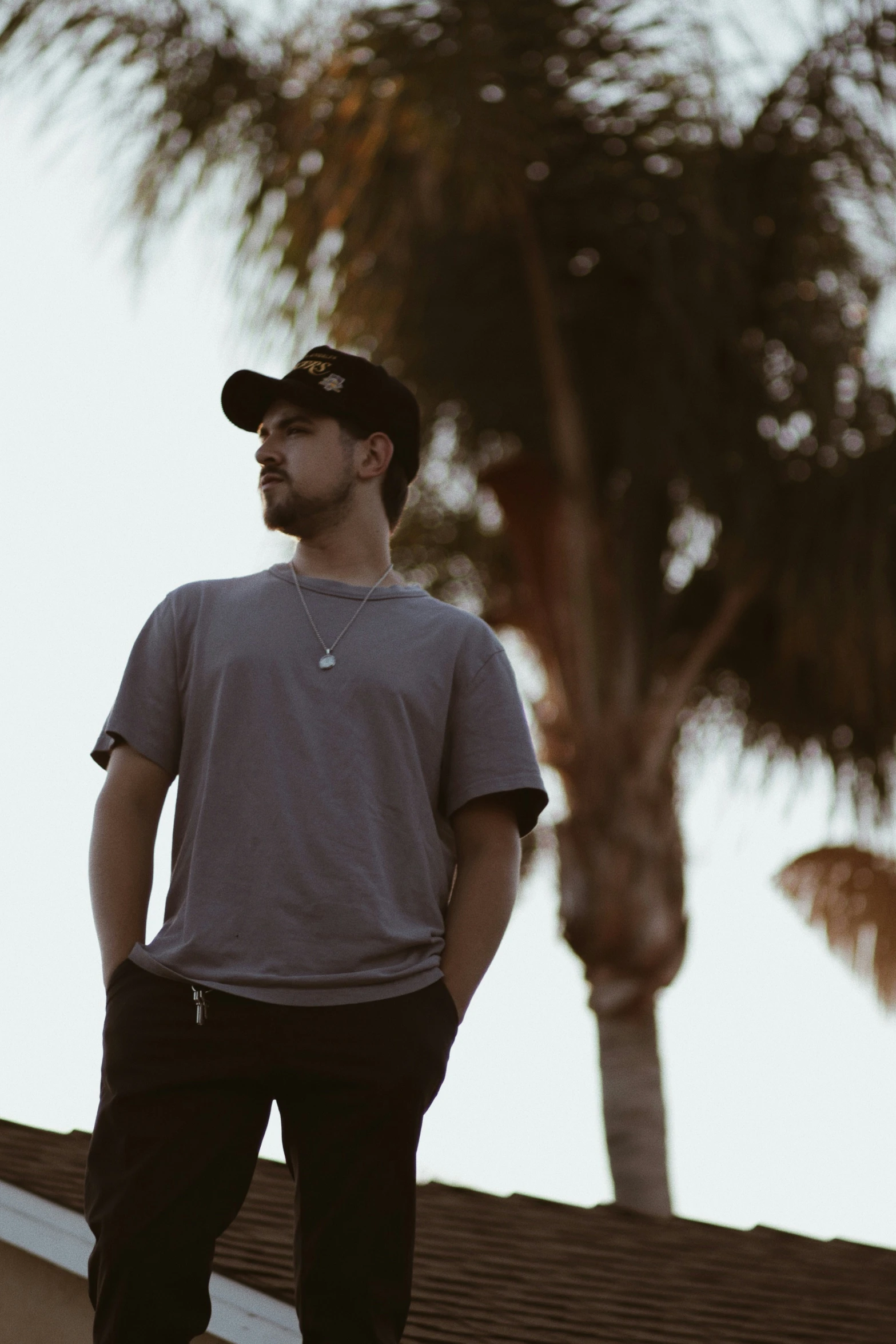 a man in a hat is standing on a ramp