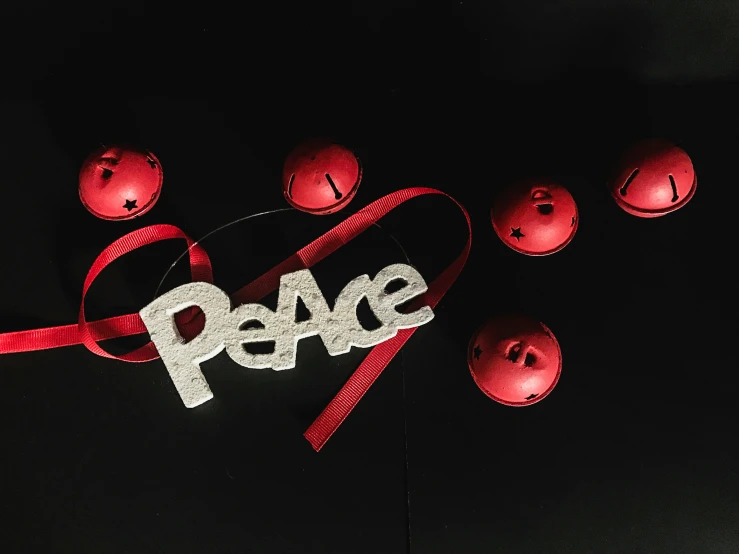 the word peace spelled out with lights surrounding it