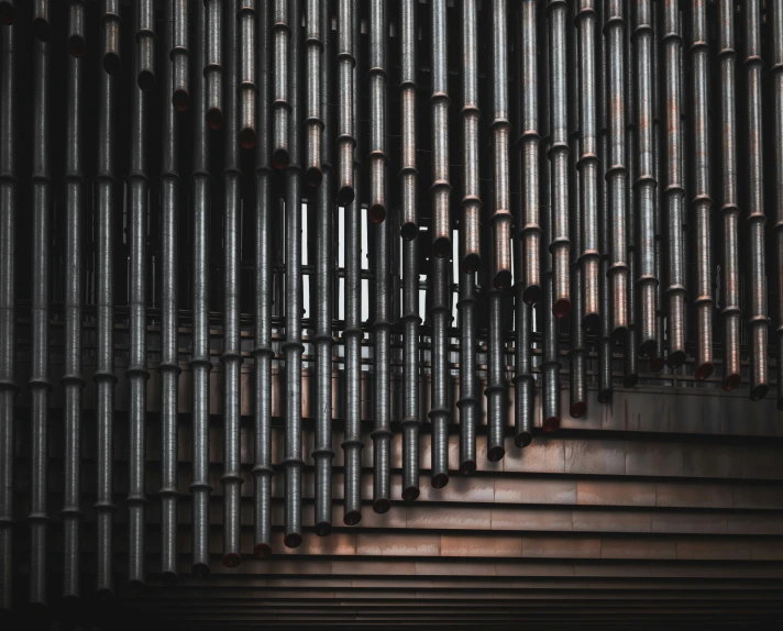 metal stairs are lined up near an empty vase