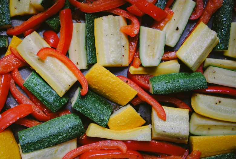 some sliced up vegetables sit on a table