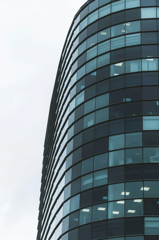 an office building with lots of windows on the side