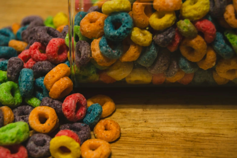 there is a pile of different colored cereal