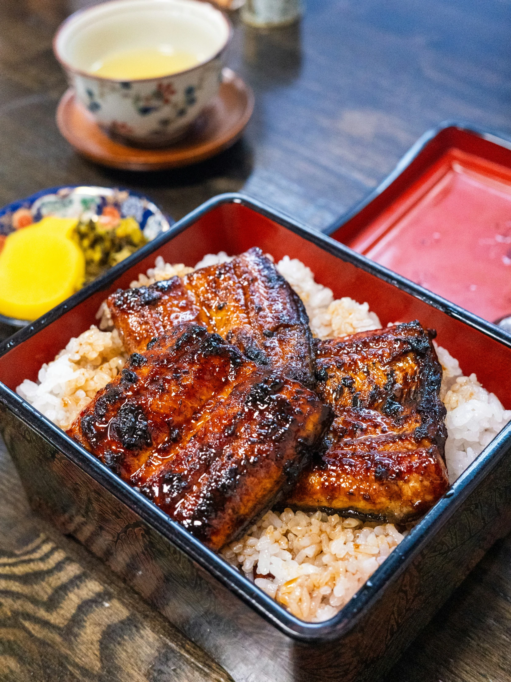 meat is served in the container next to rice