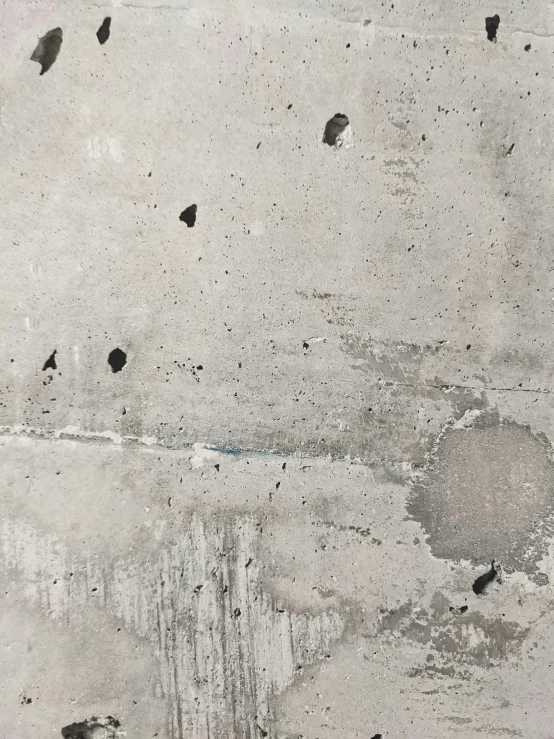 a closeup of wallpaper with a broken hole