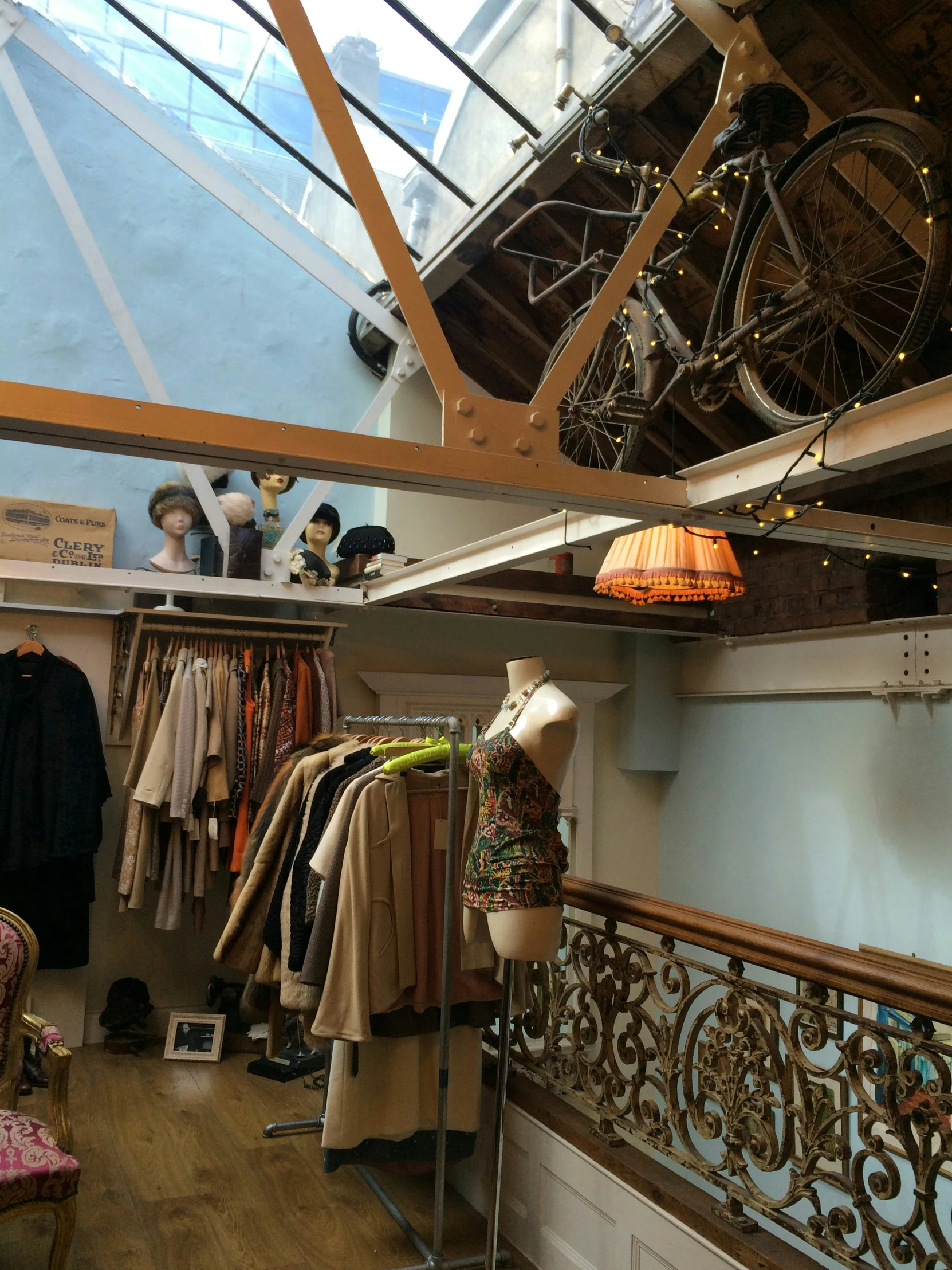 there are many clothing on display in the store