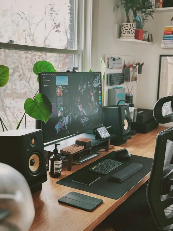 an office with a desk and two computer monitors