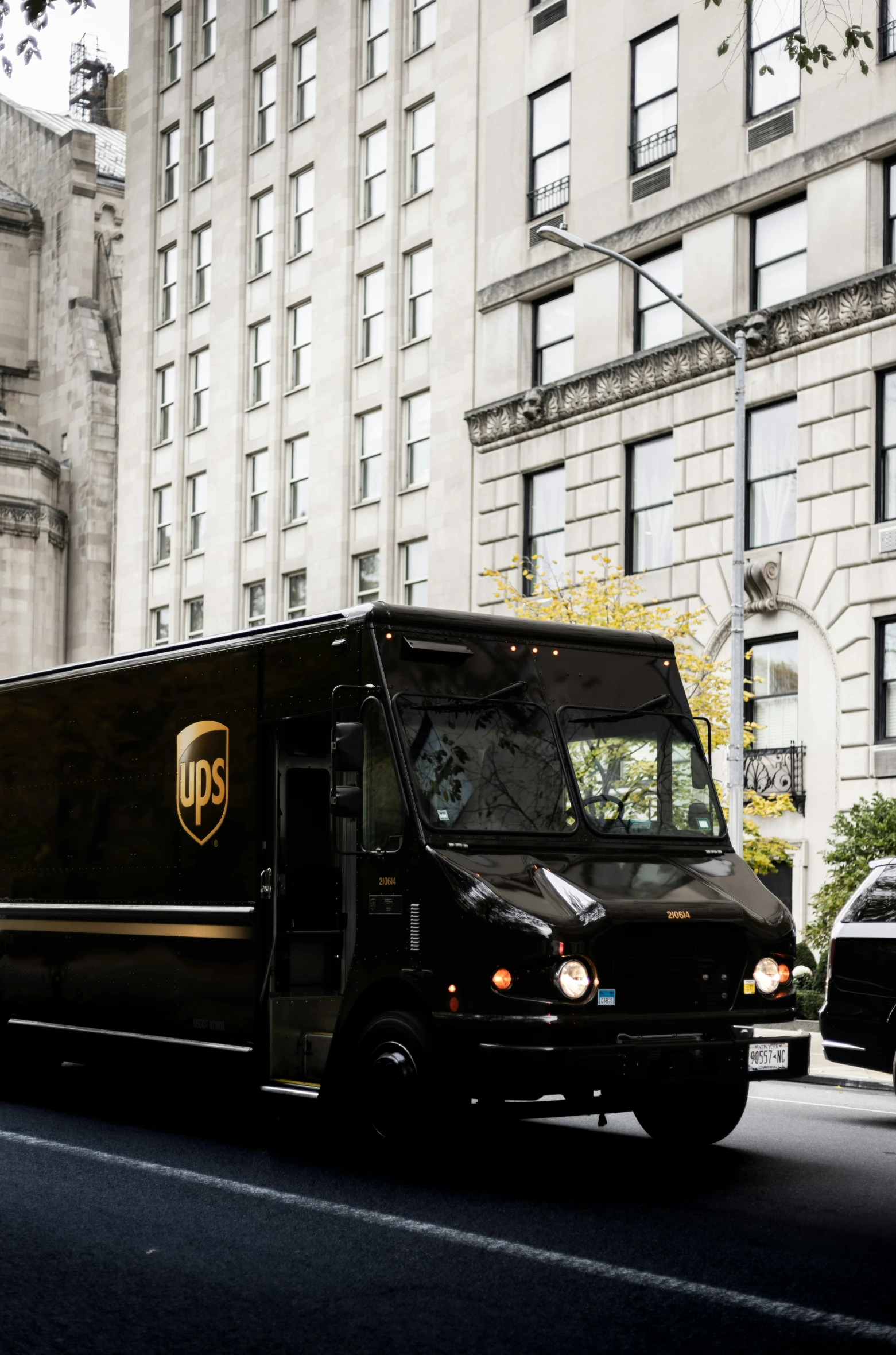 ups truck in city traffic on an empty street