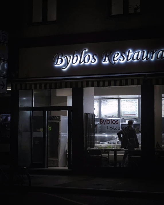 neon sign and light display at the entrance of a restaurant