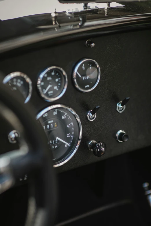 a dashboard with different gauges in a car