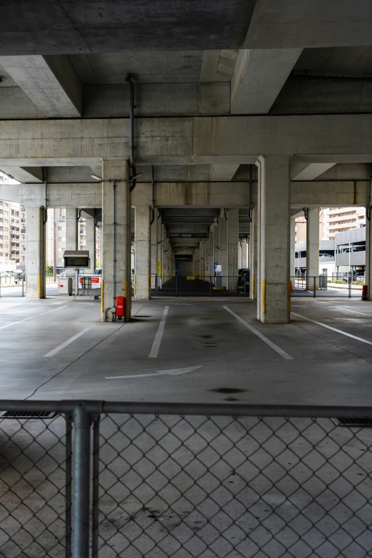 a parking garage with many traffic lights