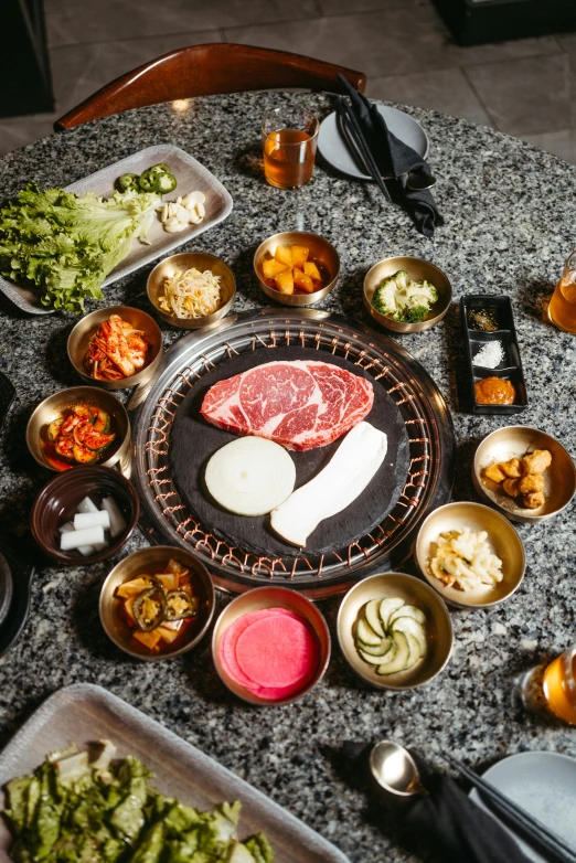 various food is laid out on a counter top