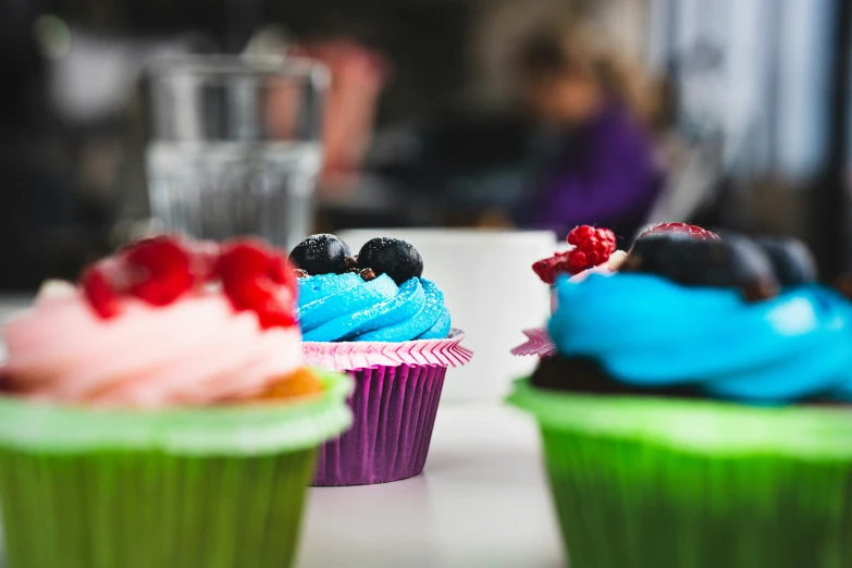 cupcakes that are sitting next to each other