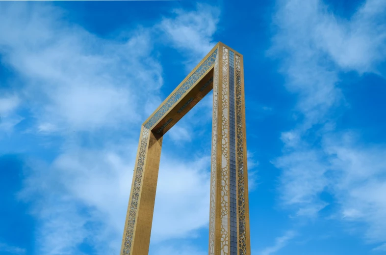 a tall wooden structure with a clock on the front