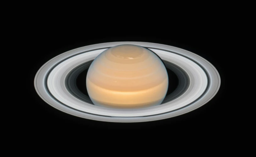 an image of saturn taken from orbit looking like a real po
