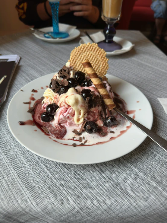 waffle cones and blueberries on a white plate