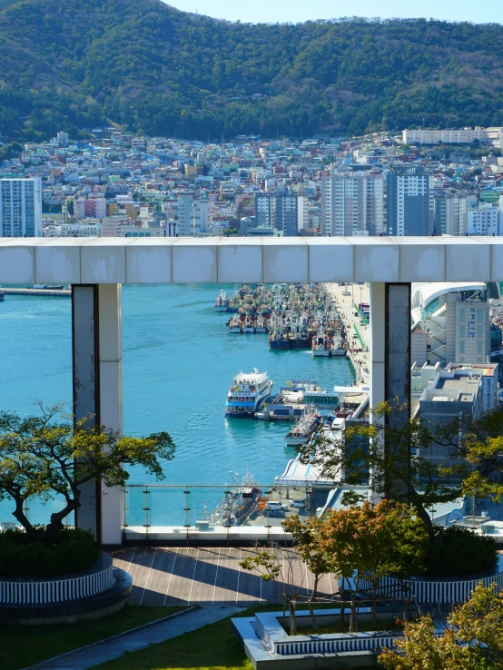 an ocean and city view taken from a bridge