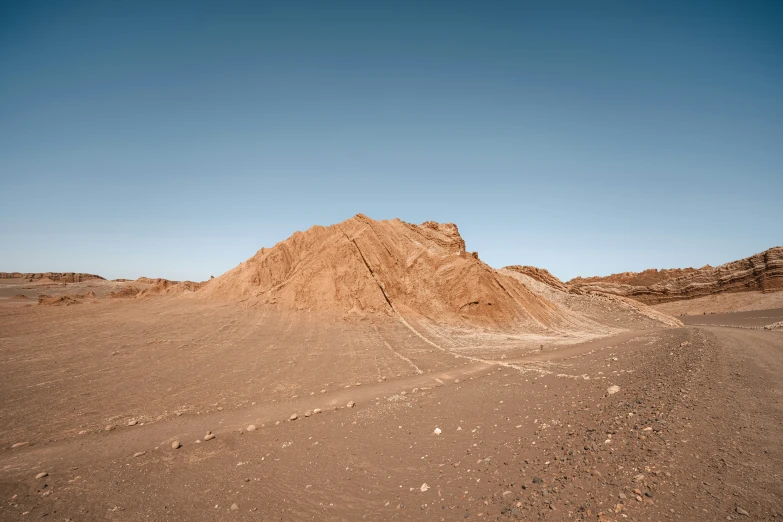 there are large mounds of dirt on this hill