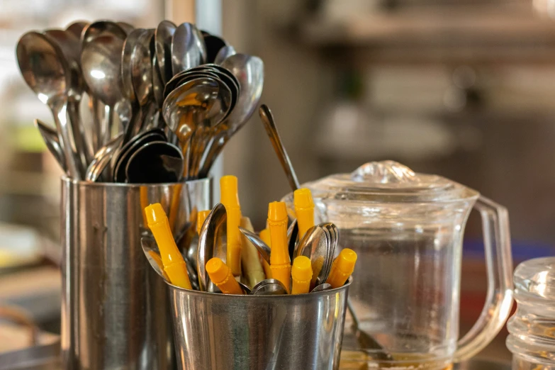 the kitchen utensils are on the table ready for consumption