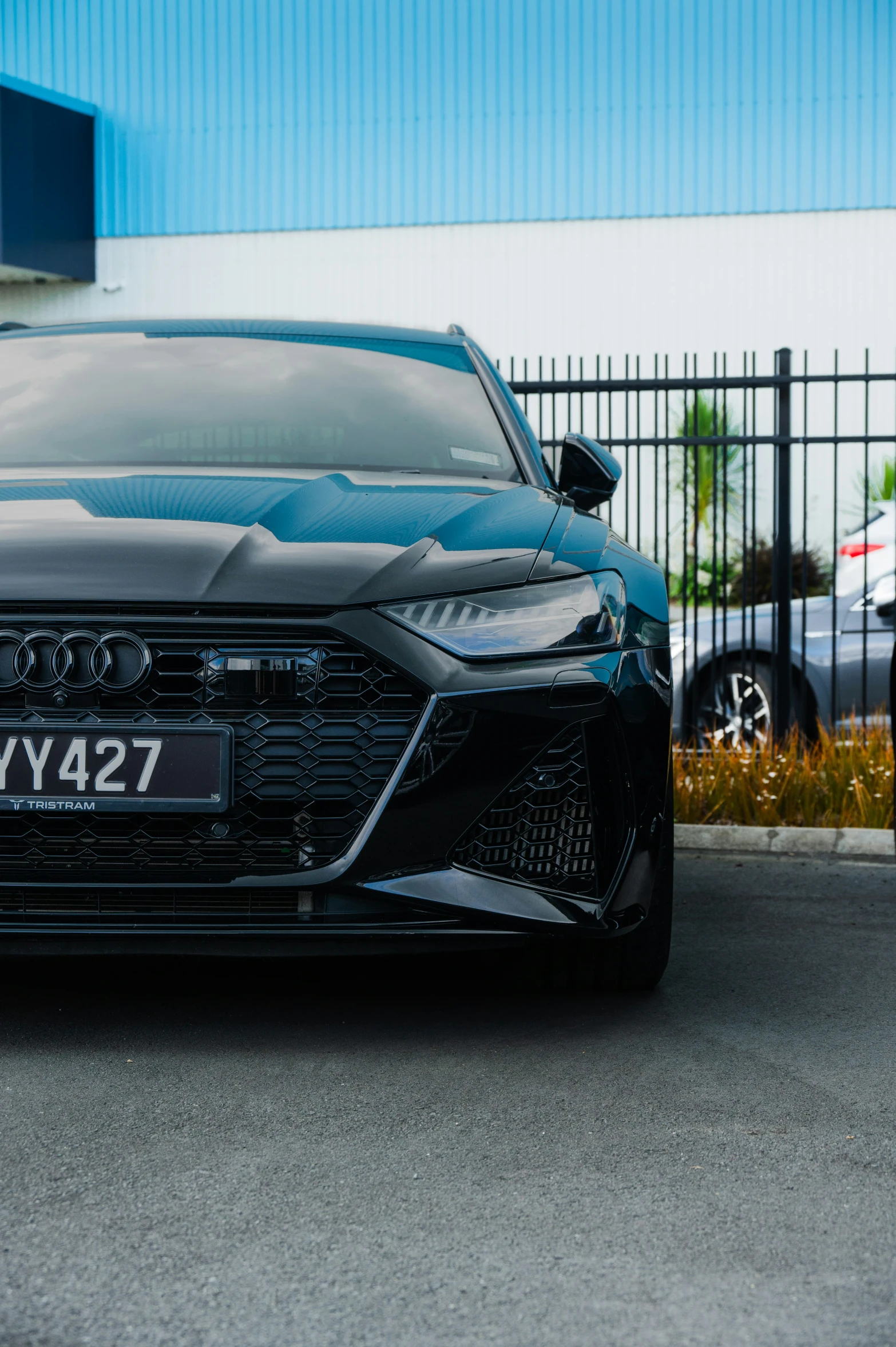 an image of a dark car that is parked