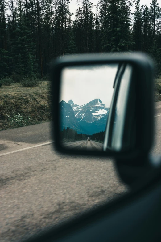 a truck has its side view mirror taken