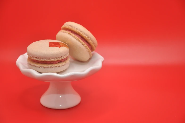 two macaroons with one half cut out of it