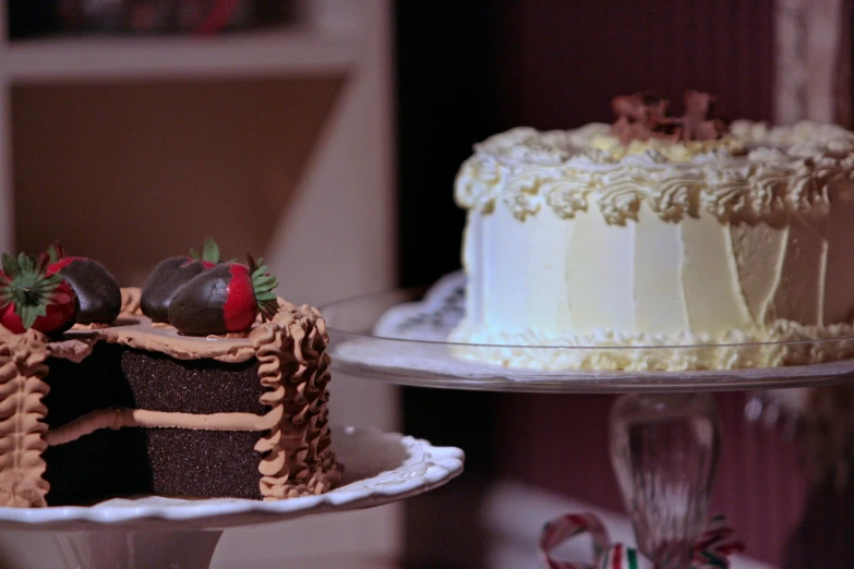 two cake layers on three trays next to one another