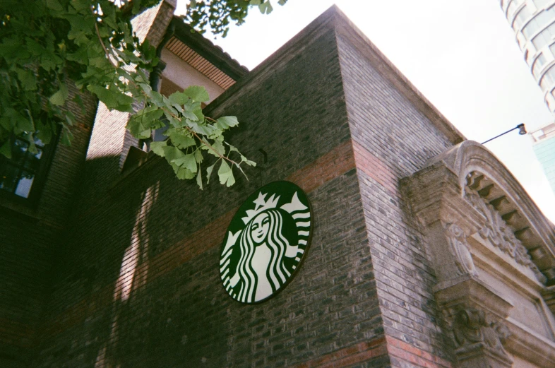 a building with a starbucks sign on it