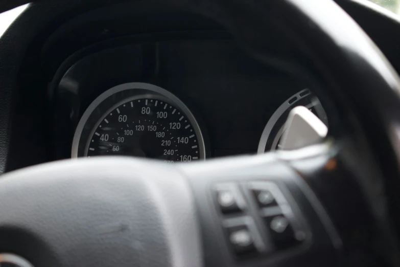 an electronic gauge of a car, showing speed