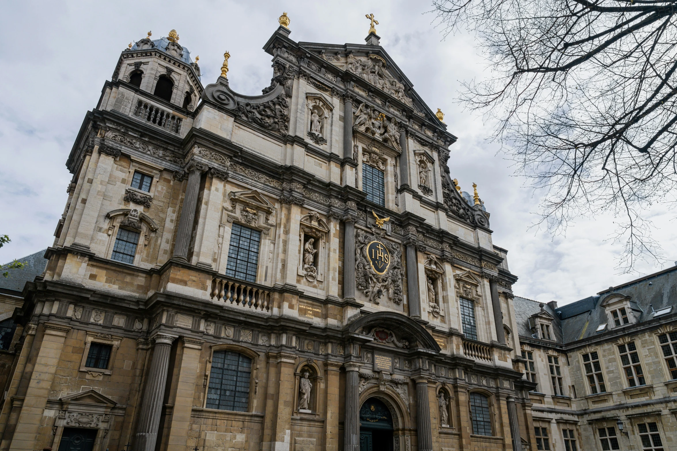 an image of an old building with clocks