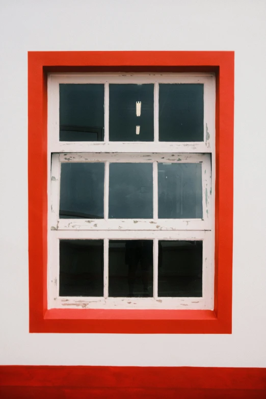 a window is shown on the side of a building