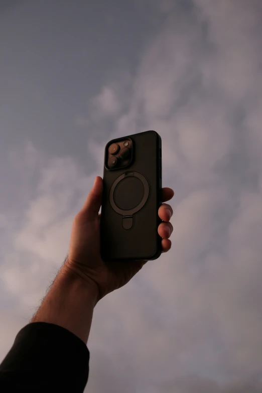 the phone has a circular lens attached to it