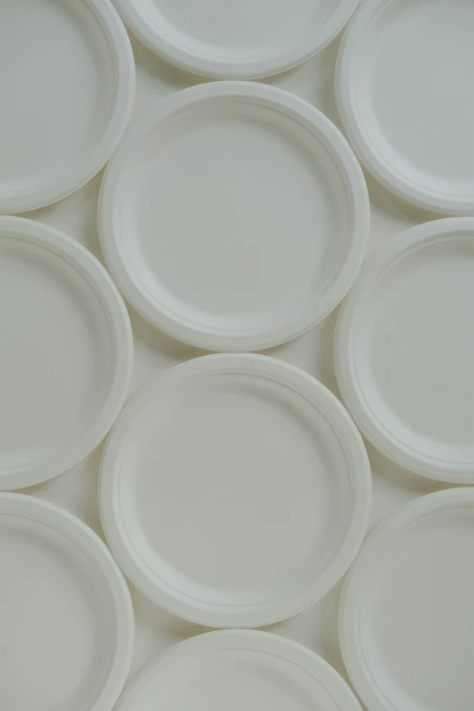 several paper plates are arranged in a circle