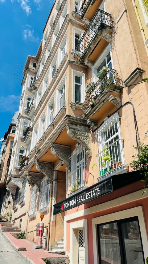 an old building has balconies on the top