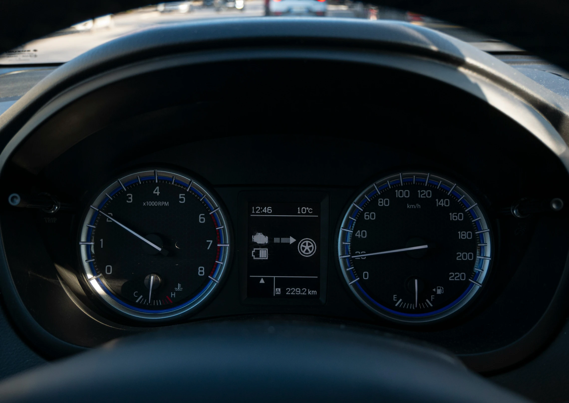 a po of some instruments on a car dashboard