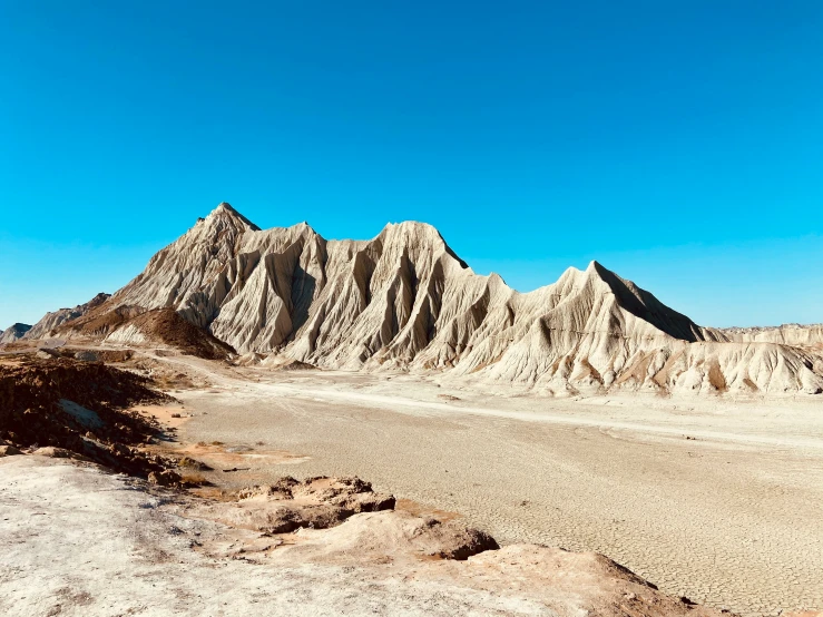 the terrain is barren and dry for a hike