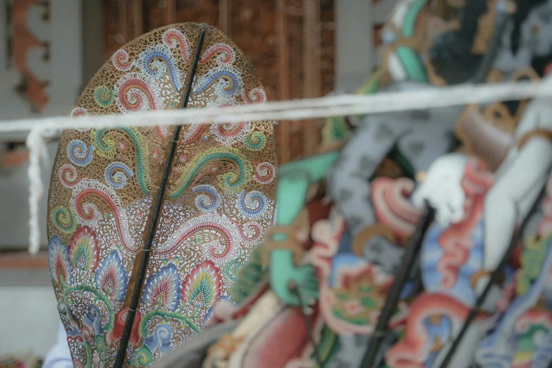 a close up of a pair of umbrellas with colorful designs