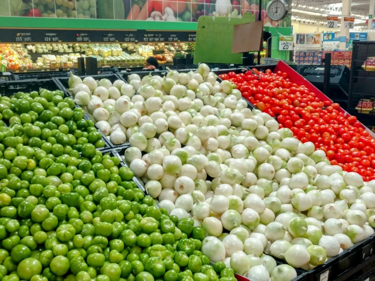 the display in the produce section is filled with vegetables