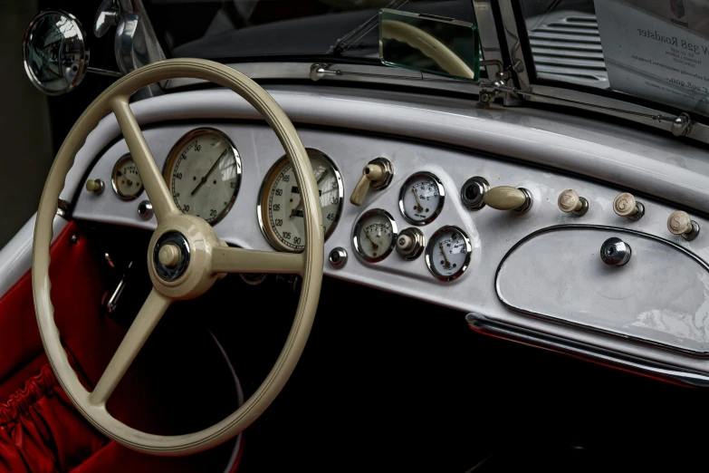 a car dashboard, gauges, and instrument in it