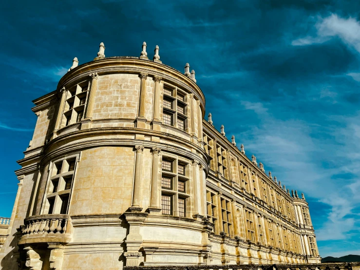 a very large stone building that has ornate architecture